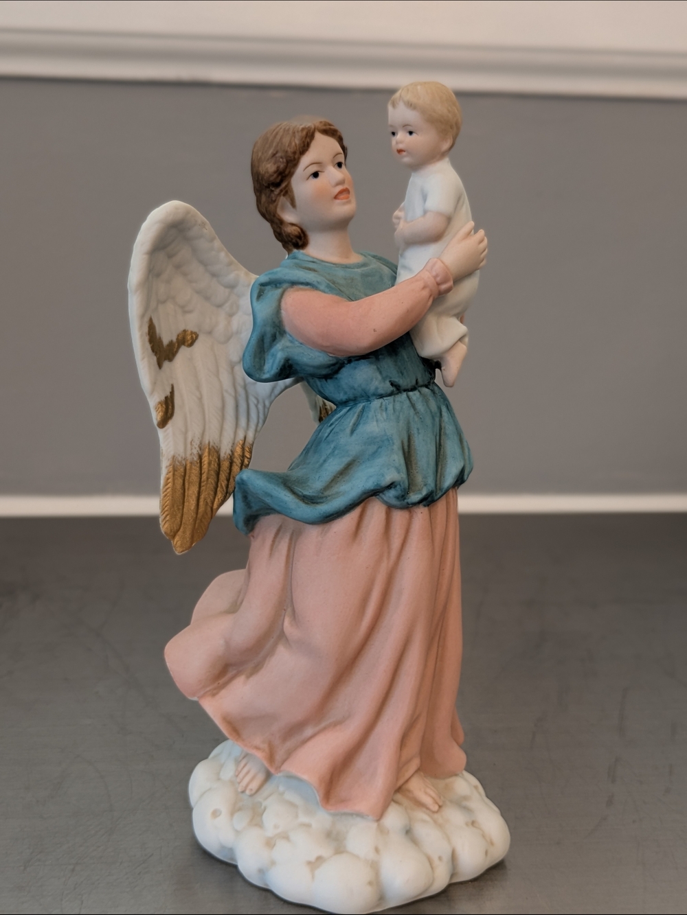 Angel Holding Child Porcelain Figurine - Pink & Blue